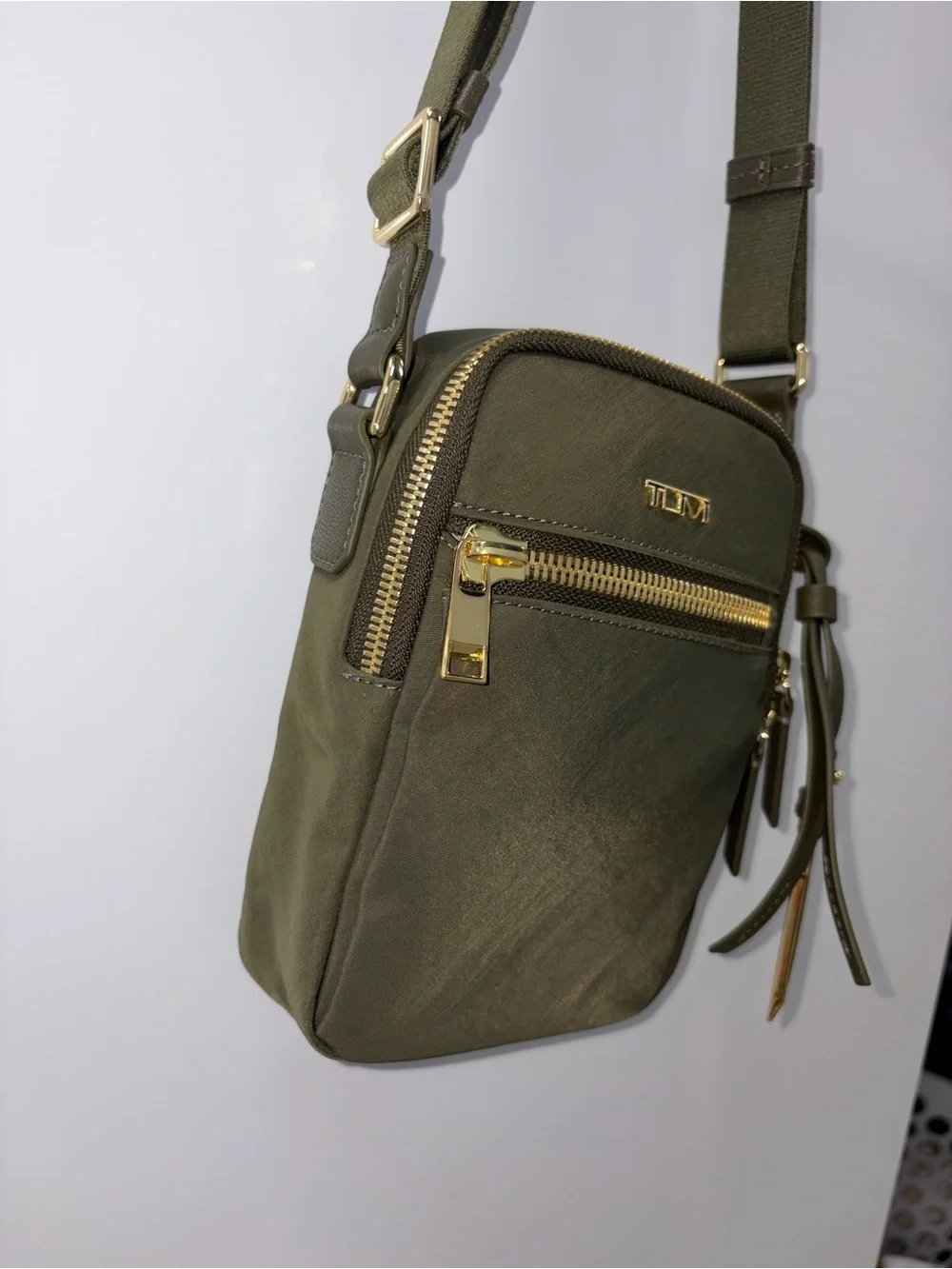 Tumi VOYAGER Olive Green Compact Crossbody with Gold Hardware